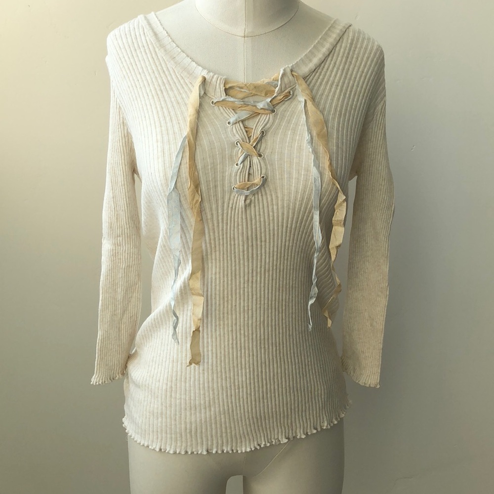 Cute top with ribbon lace-up front.
